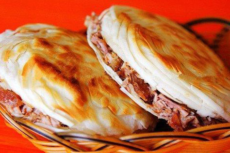 餐饮加盟创业选择开一家老潼关肉夹馍店是很受创业人青睐